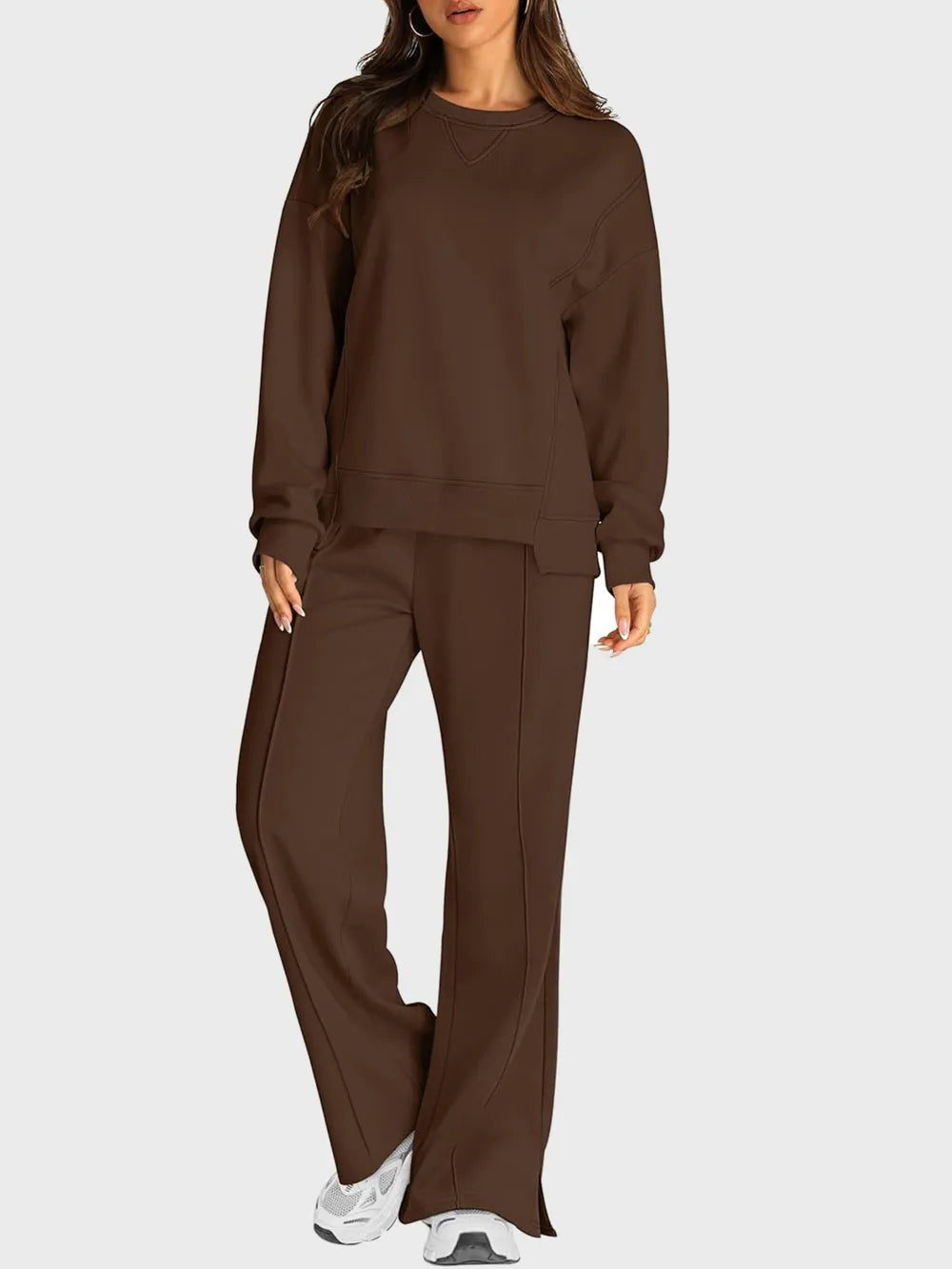 Trendsi round neck long sleeve top and slit pants set, stylish matching casual outfit, black fabric, front view.