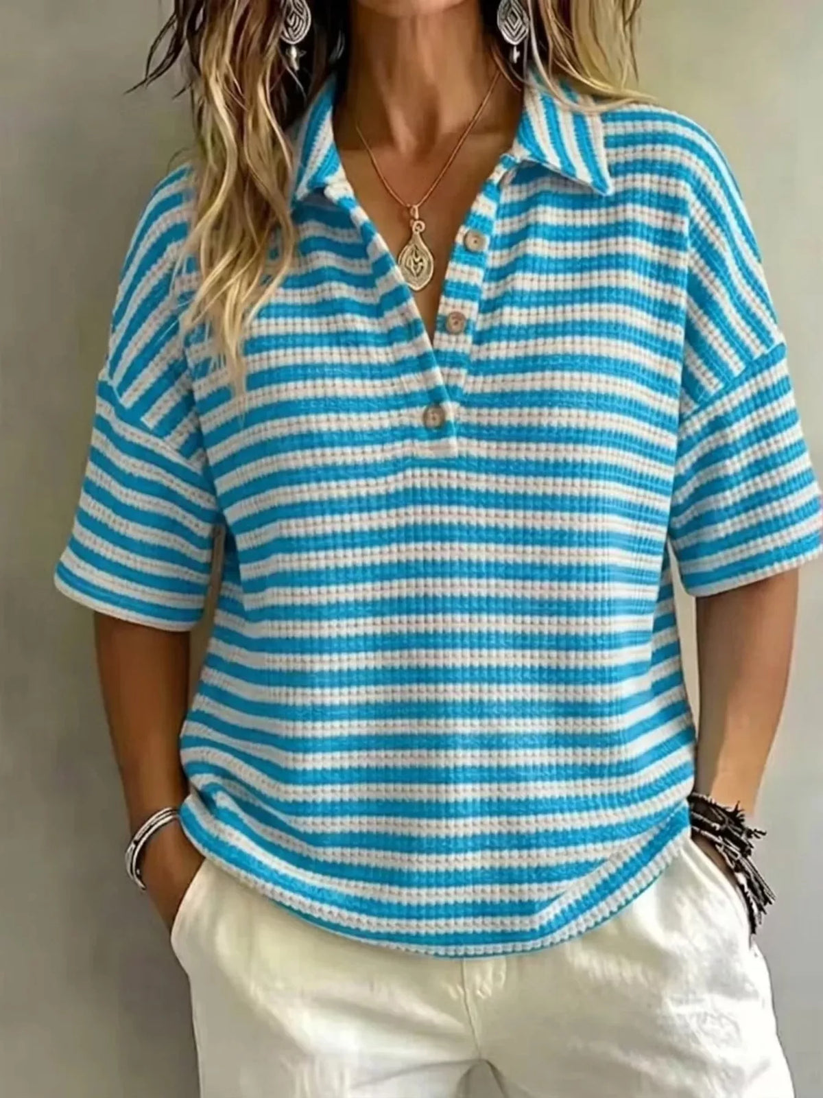 Plus size contrast striped knit polo shirt for women, featuring a classic collar and short sleeves, from Trendsi.