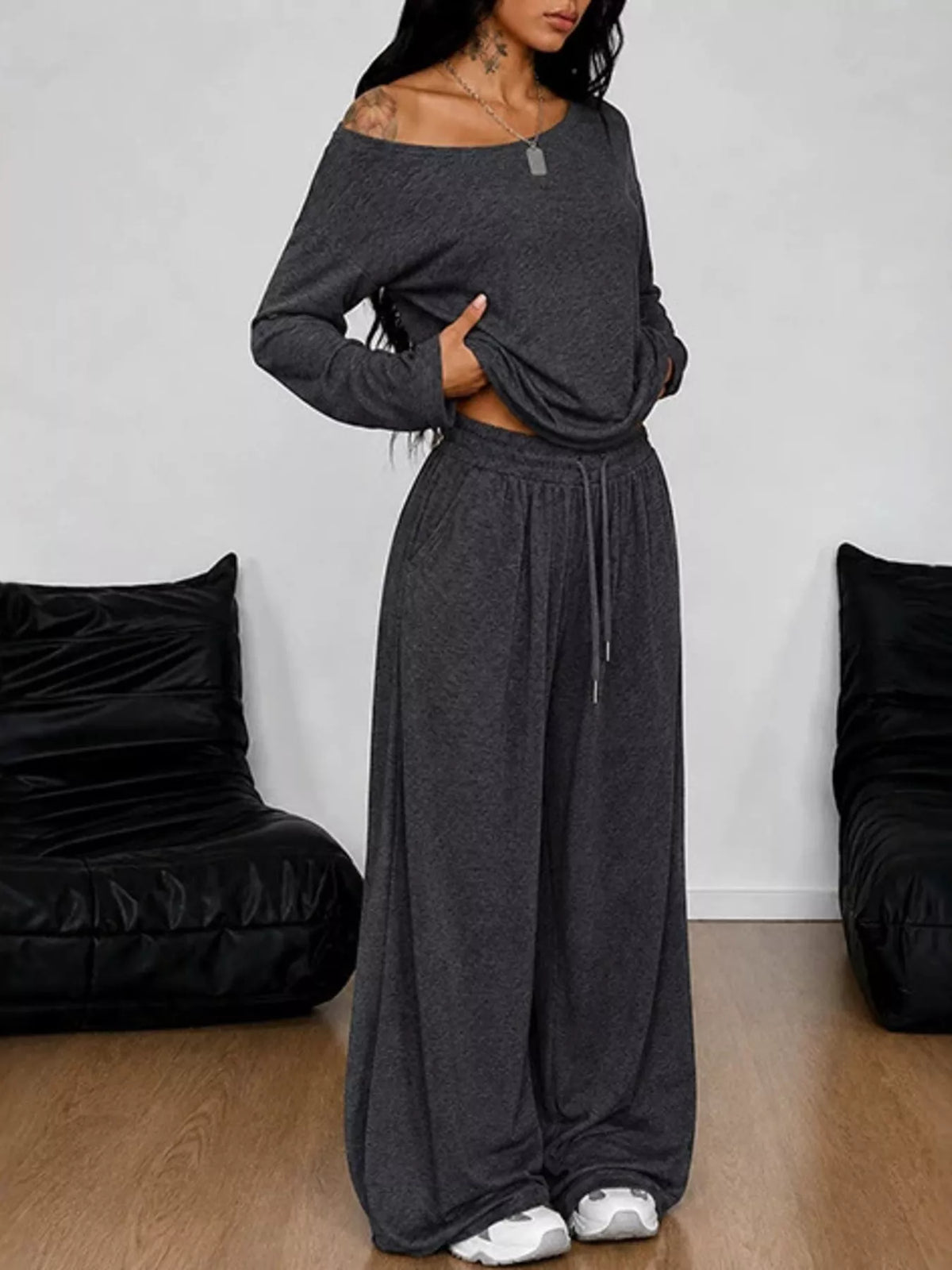 Plus size one-shoulder top and drawstring pants set by Trendsi, stylish matching outfit with relaxed fit and comfortable design.