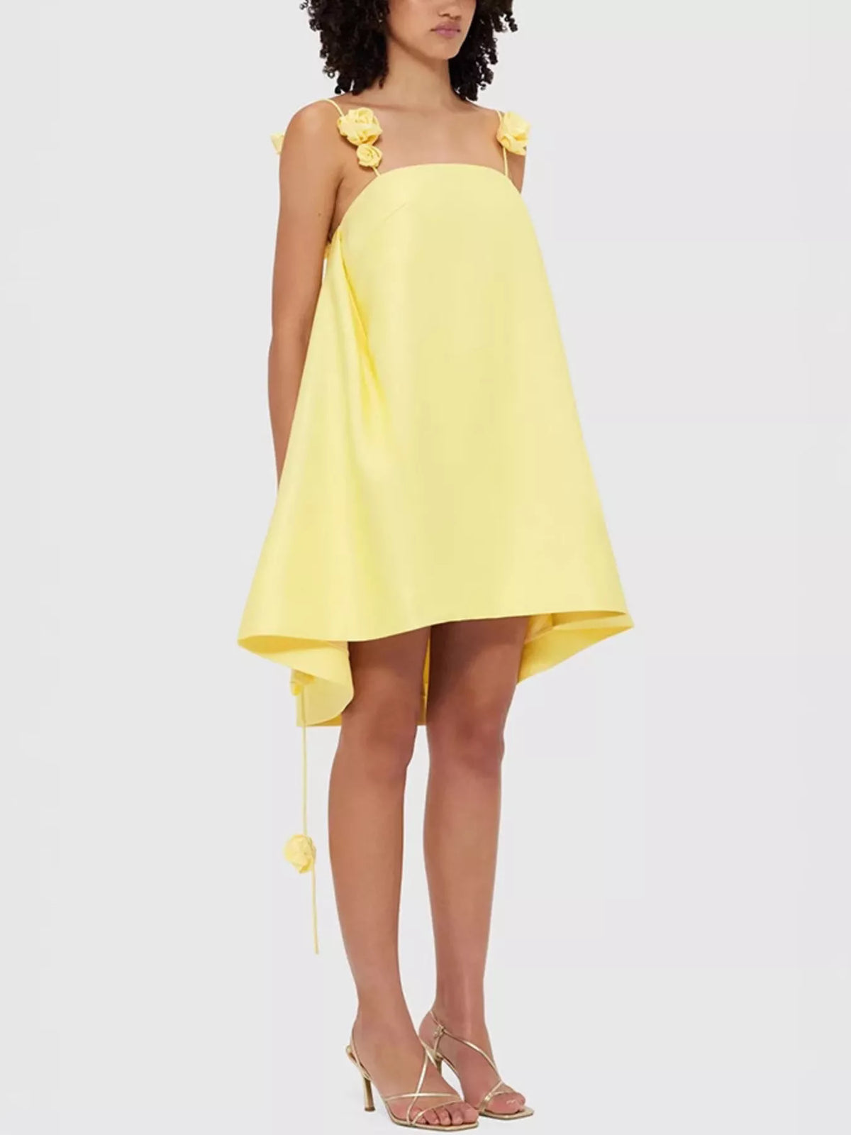 Floral strap mini A-line dress by Plush Fashion Hub featuring a fitted bodice and flowy skirt, perfect for casual or summer wear.