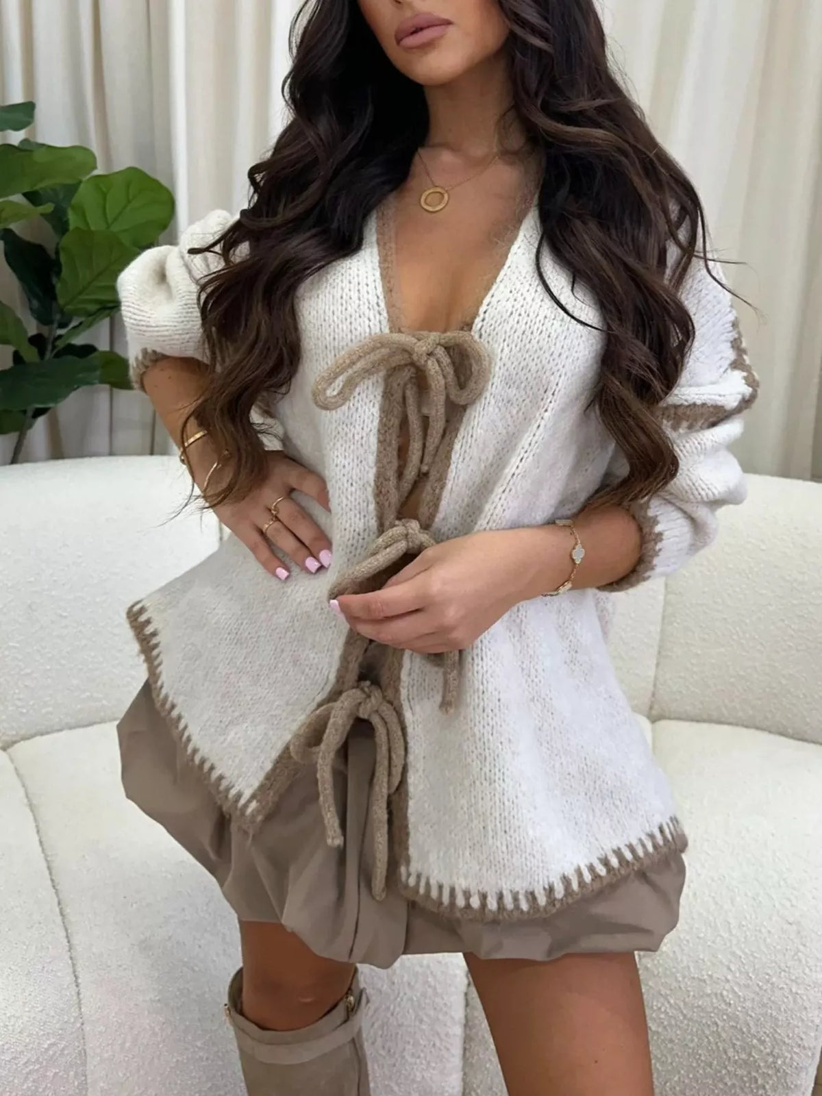 Light beige tie front drop shoulder cardigan from Trendsi, featuring a relaxed fit and soft knit fabric.