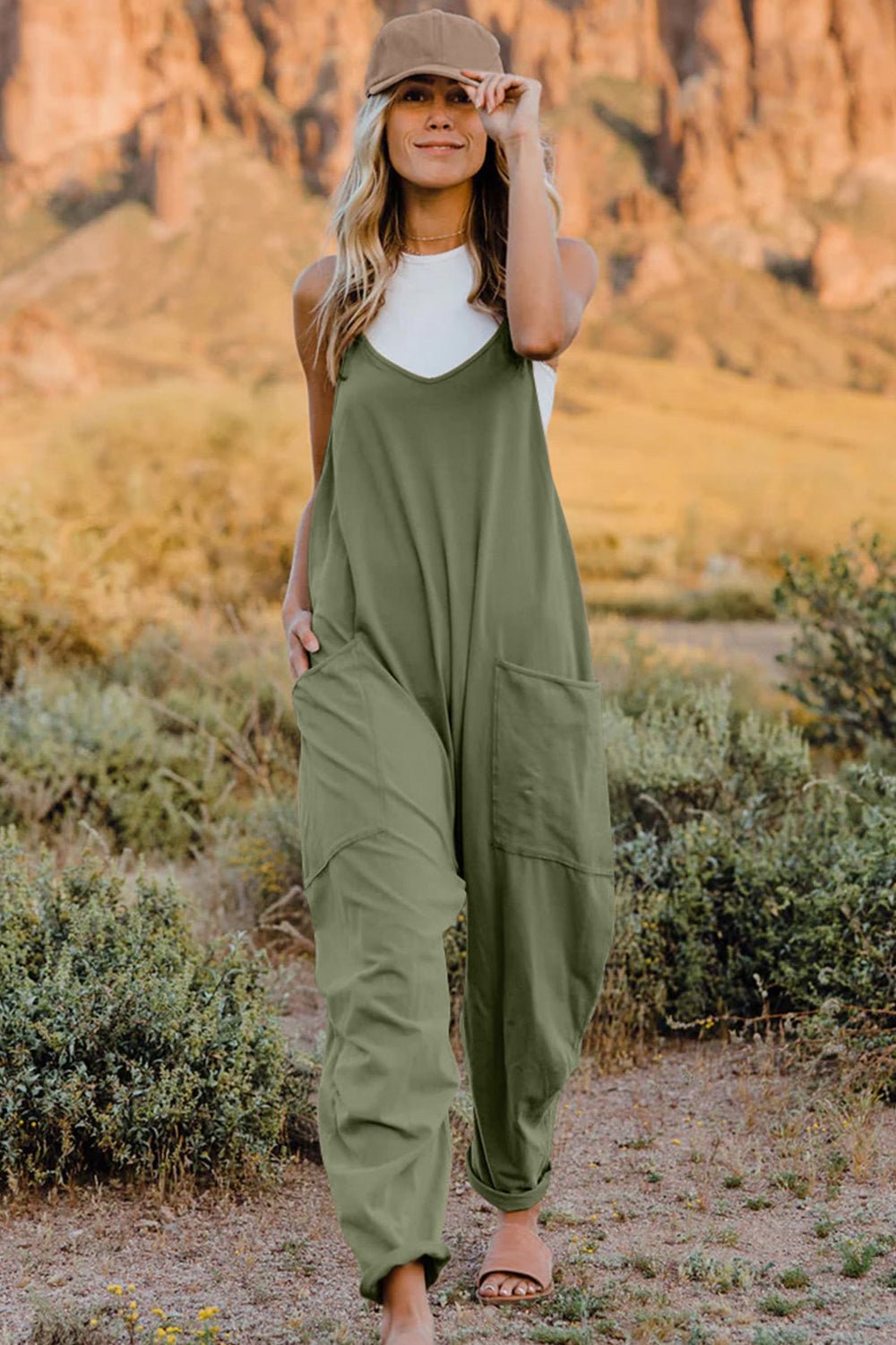 Women’s sleeveless V-neck casual jumpsuit with pockets, lightweight and comfortable, by Plush Fashion Hub.