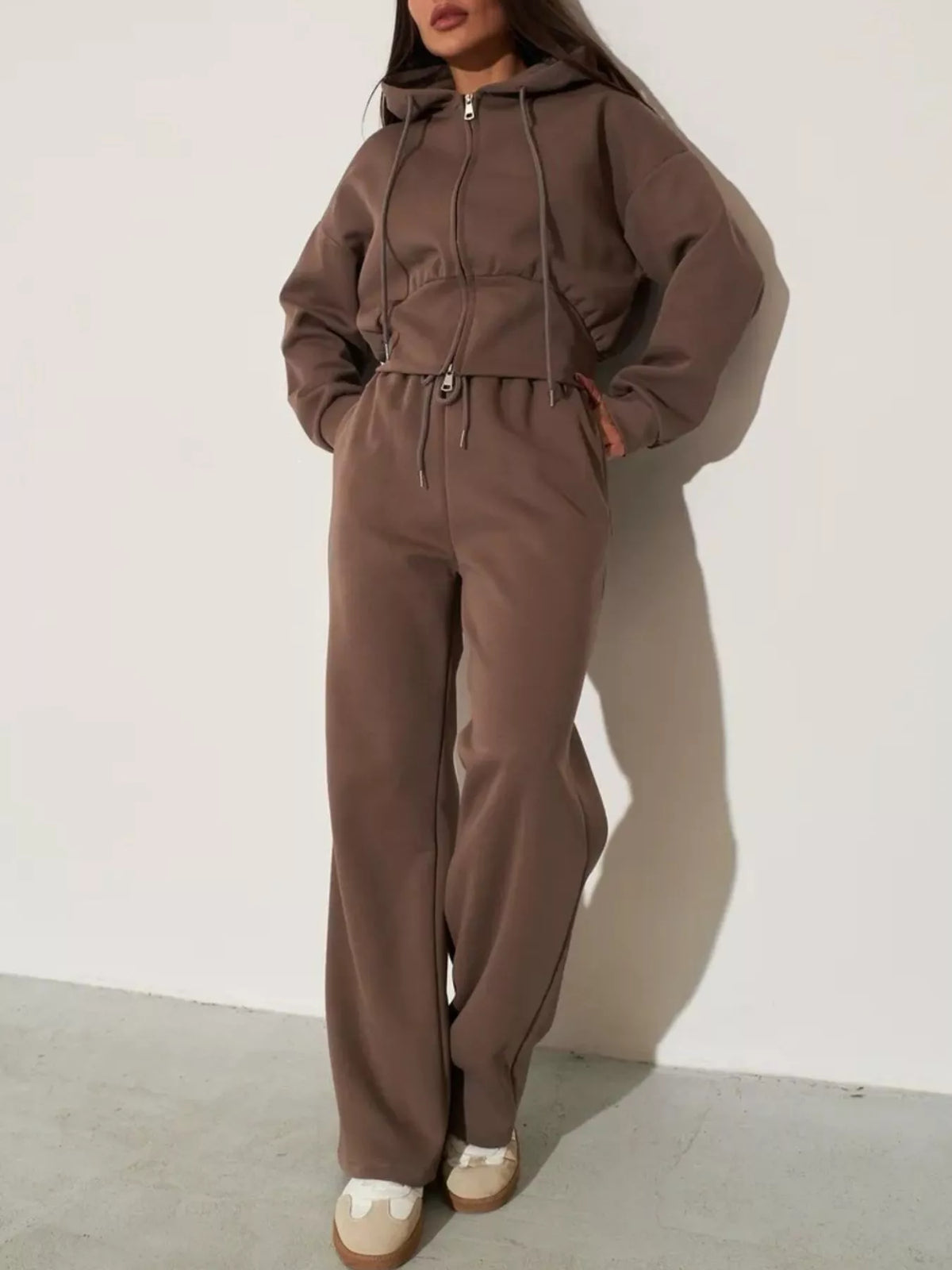 Plush Fashion Hub zip-up hoodie and wide-leg pants loungewear set, featuring comfortable fabric and casual style.