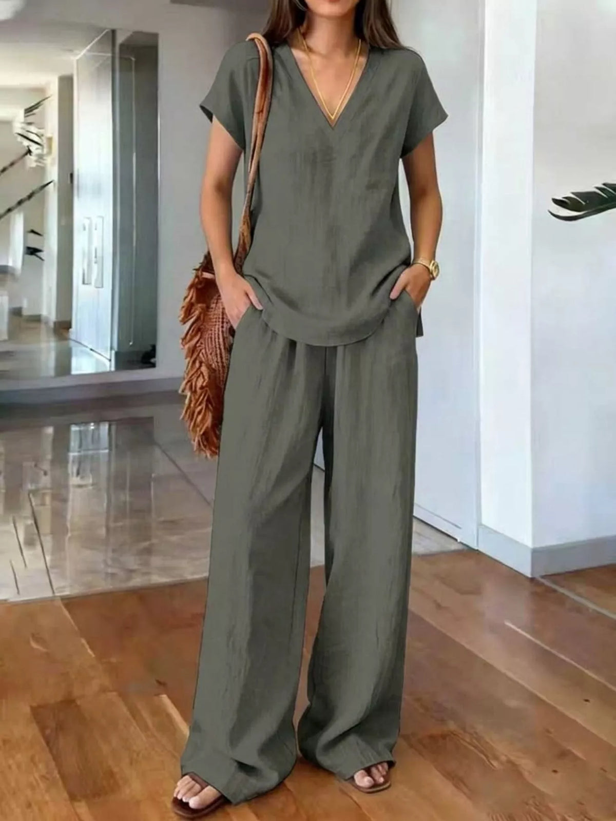 Plus size V-neck short sleeve lounge set with matching pants by Plush Fashion Hub, comfortable loungewear for relaxed wear.