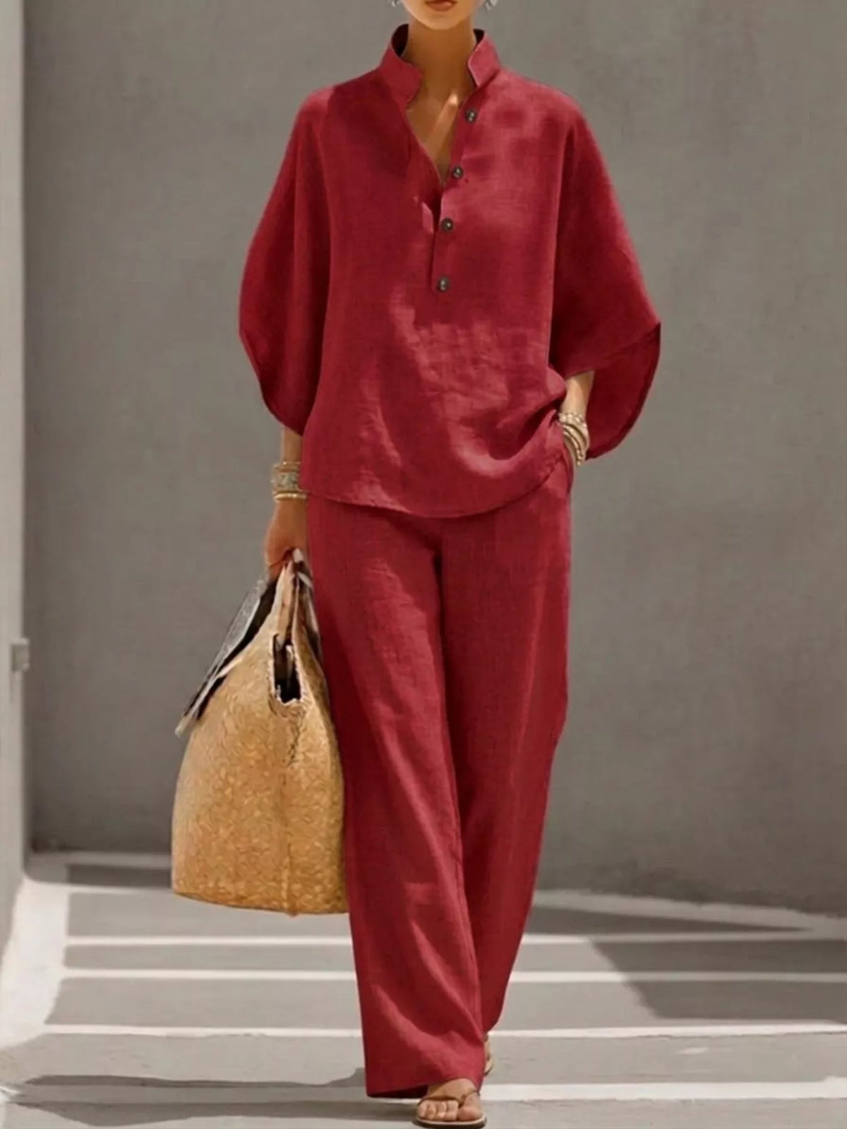 Plus size women's two-piece dress set with button details and 3/4 sleeves by Plush Fashion Hub, featuring a stylish top and pants.