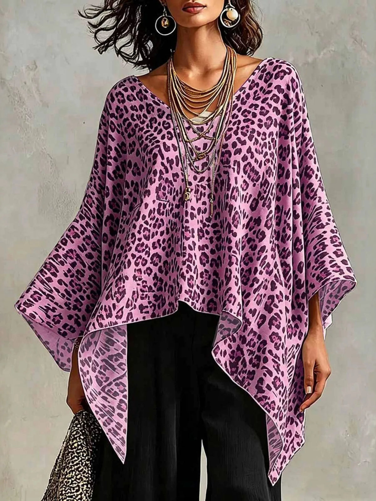 Plus size leopard print asymmetrical hem top from Plush Fashion Hub, showcasing a stylish, flowing design and bold animal print.