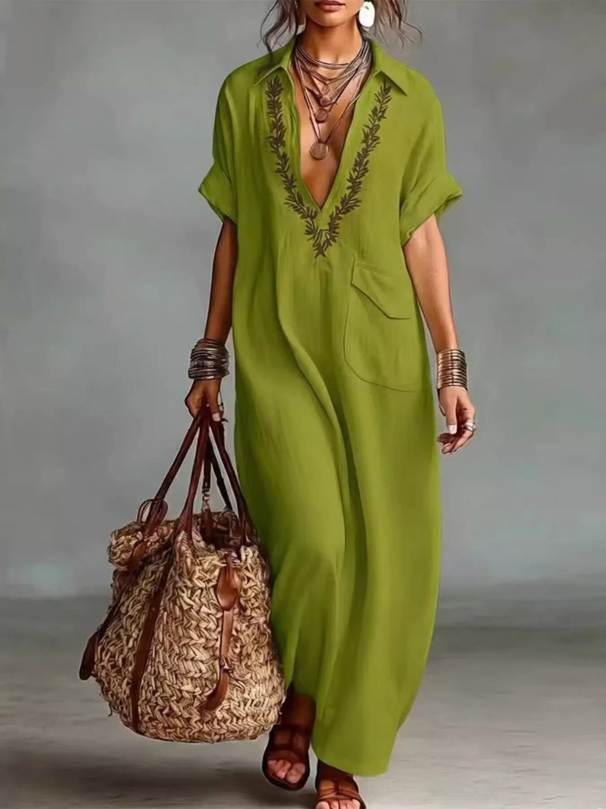 Plus size full bohemian embroidered maxi dress featuring vibrant patterns and flowy fabric, ideal for boho-style fashion.