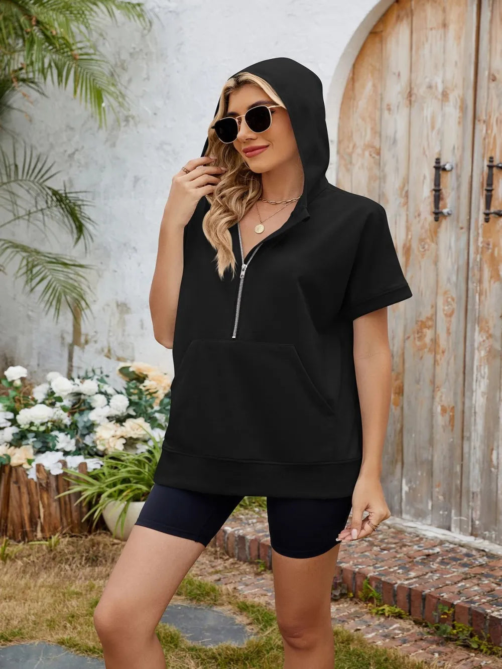 Plush Fashion Hub short sleeve hooded half zip top with a relaxed fit, featuring a front half zipper and casual style.