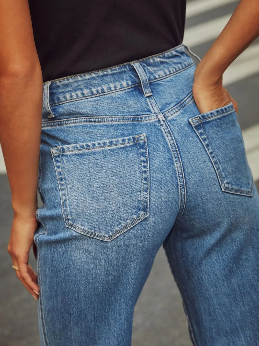 Trendsi high waisted straight leg rolled denim jeans shown on a model, featuring classic blue denim and a relaxed fit.