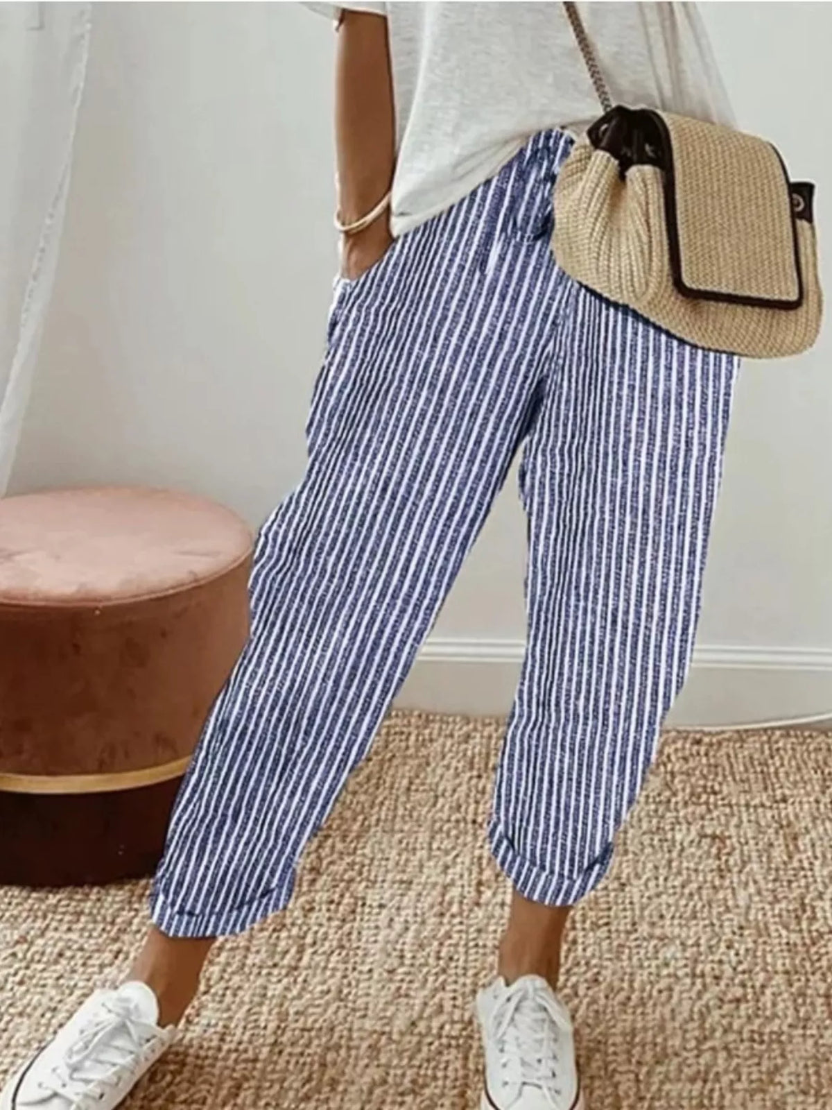 Striped cropped pants from Plush Fashion Hub showing a relaxed fit with bold horizontal stripes and a stylish cropped length.
