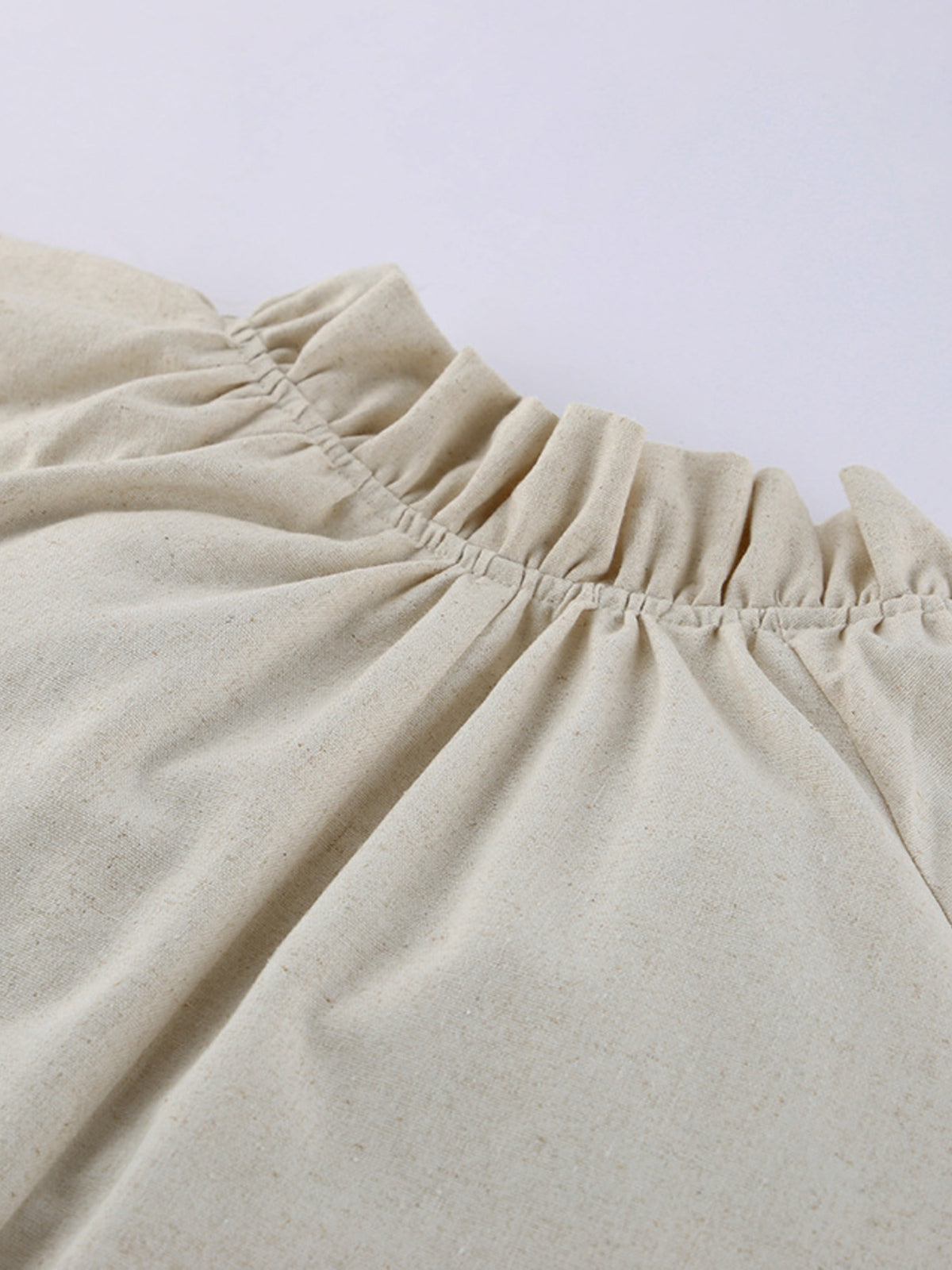 Cotton linen maxi dress with tie neck and flounce sleeves by Plush Fashion Hub, shown in a flowing, elegant style.