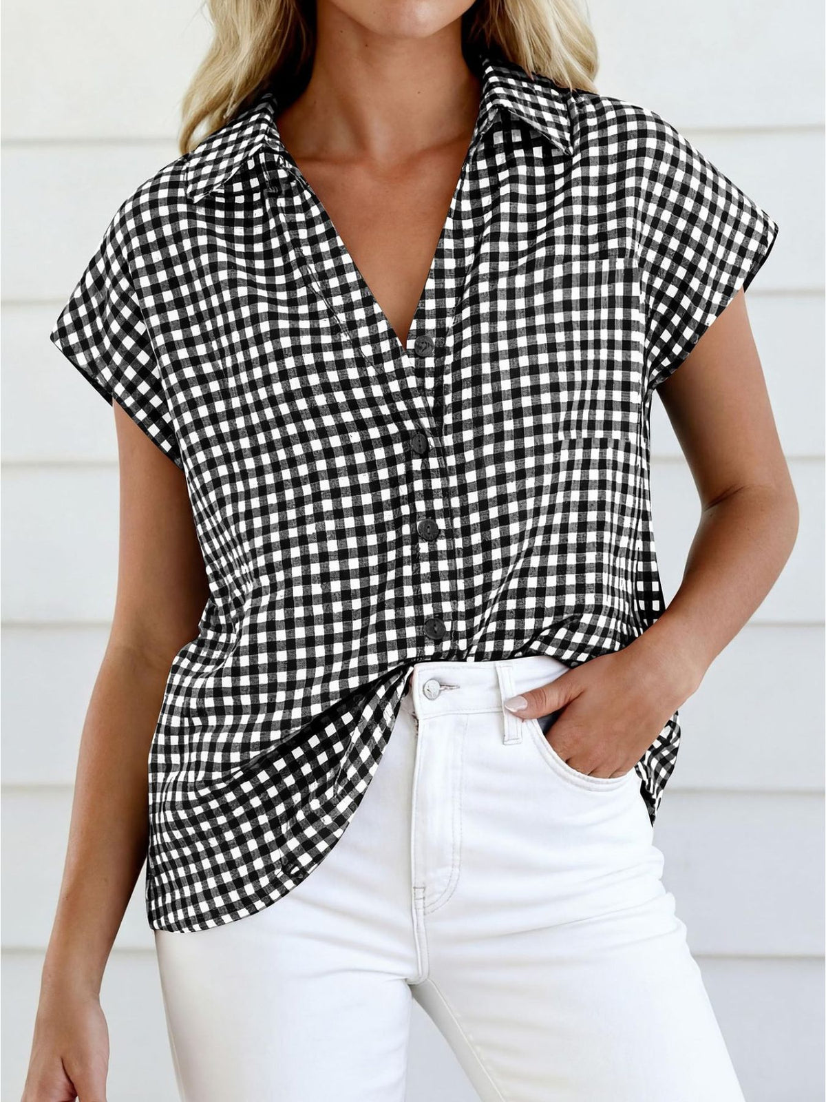 Women's gingham print button-down shirt with tie detail by Plush Fashion Hub, featuring a classic style and collar design.