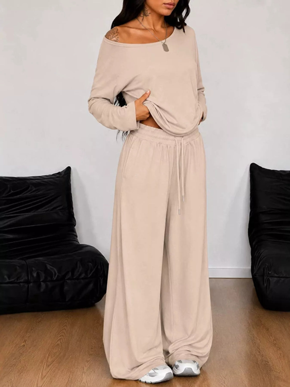 Plus size one-shoulder top and drawstring pants matching set by Trendsi, stylish full-size ensemble with trendy design.