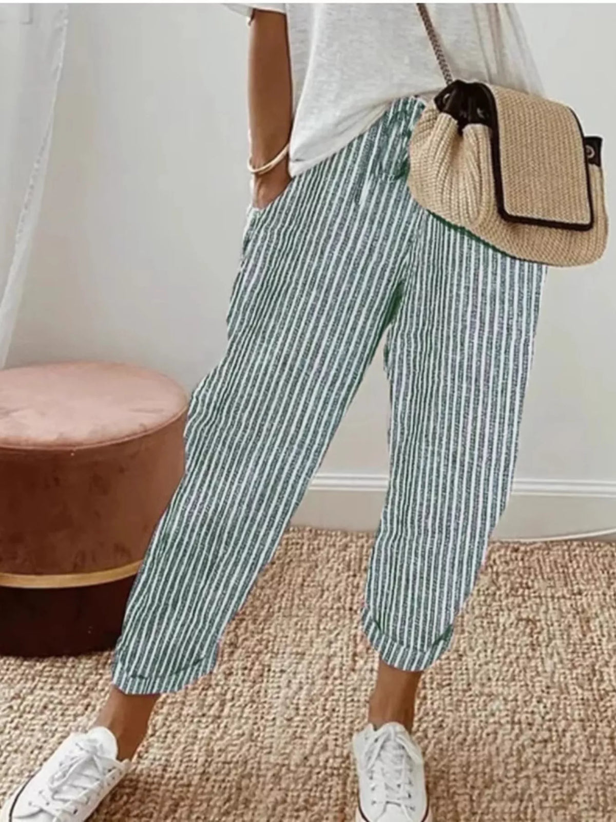 Striped cropped pants from Plush Fashion Hub featuring a stylish pattern and relaxed fit, perfect for casual wear.