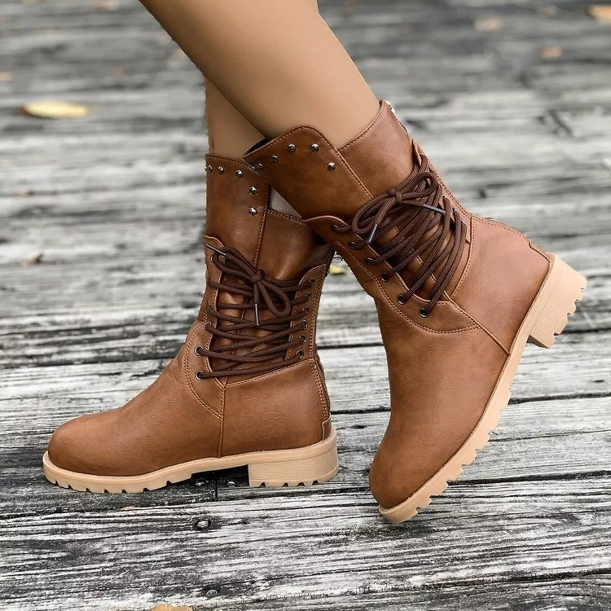 Lace-up block heel boots in stylish footwear, featuring a trendy design from Trendsi with a sleek, modern look.