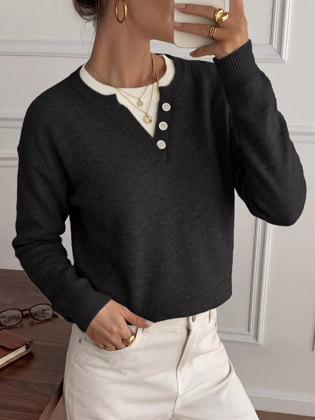 Ribbed knit sweater with button-placket detail from Trendsi, featuring a cozy, fitted design in neutral tones.
