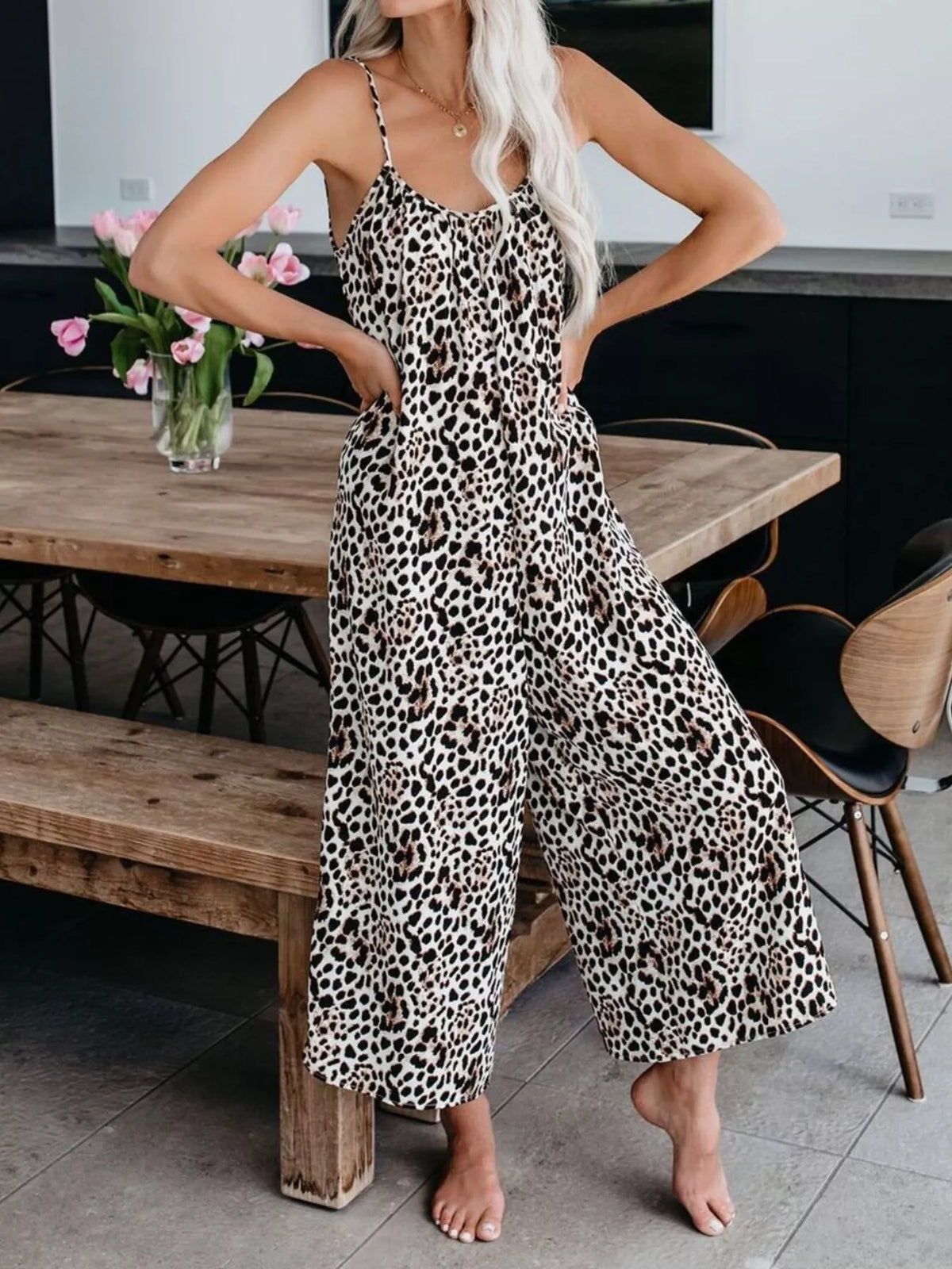 Plus size tie-dye wide-leg jumpsuit from Plush Fashion Hub, featuring a vibrant pattern and relaxed fit for casual style.