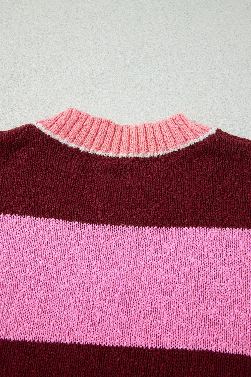 Striped drop shoulder long sleeve knit sweater from Trendsi, featuring a regular fit and cozy design.
