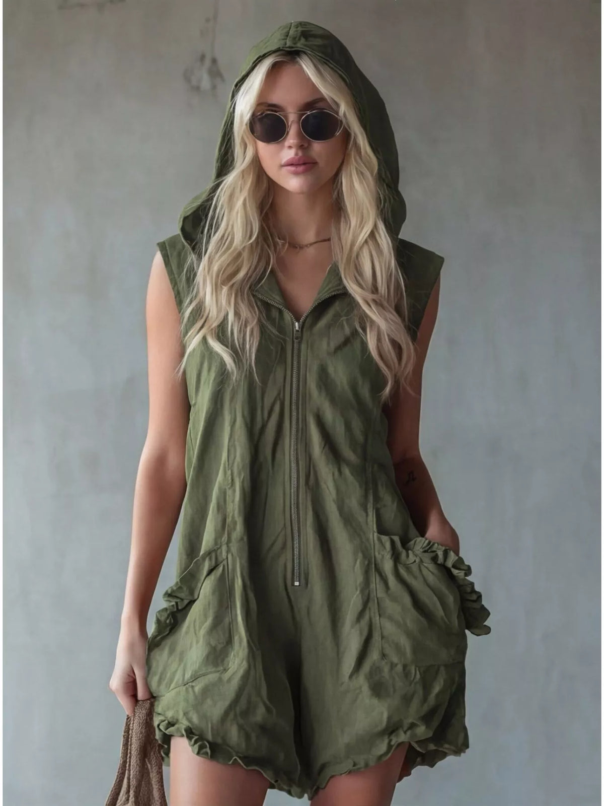 Plus size hooded sleeveless zipper romper by Plush Fashion Hub with ruffled pockets, full size, casual and stylish design.