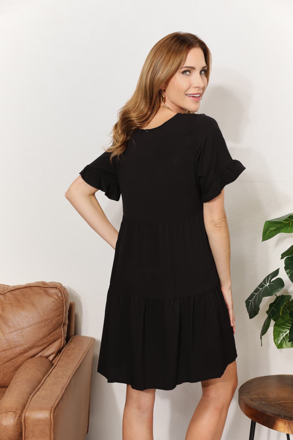 Women’s Mandy solid V-neck tiered casual dress with flounce sleeves from Plush Fashion Hub, featuring a relaxed fit and stylish design.
