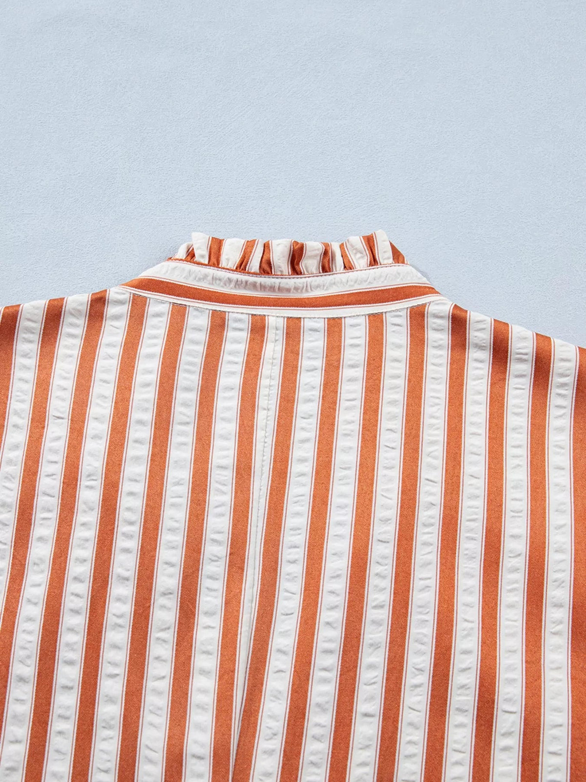 Striped V-neck mini dress by Plush Fashion Hub featuring turn-up cuffs, pockets, and a fitted silhouette.